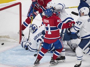 Canadiens' Paul Byron (41) scores against Toronto Maple Leafs goaltender Frederik Andersen as Leafs' Nikita Zaitsev (22) and Leo Komarov (47) defend during first period NHL hockey action in Montreal, Saturday, Nov. 19, 2016.