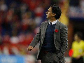 Impact head coach Mauro Biello looks on during the second half against the New York Red Bulls during an MLS Eastern Conference semifinal soccer match at Red Bull Arena in Harrison, N.J., Sunday, Nov. 6, 2016.