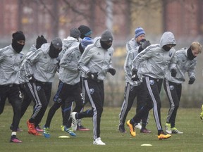 Members of the Montreal Impact warm up during a practice Tuesday, November 29, 2016 in Montreal. The Impact will face the Toronto FC in the second leg of the MLS Eastern Conference final Wednesday.