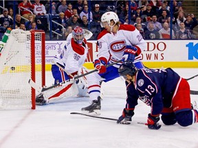 Cam Atkinson #13 of the Columbus Blue Jackets beats Jeff Petry #26 of the Montreal Canadiens and Al Montoya #35 of the Montreal Canadiens for a goal during the second period on Nov. 4, 2016 at Nationwide Arena in Columbus, Ohio.