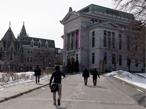 Students walk on the main campus of McGill University in Montreal on Tuesday April 1, 2014.