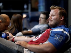 Montreal Alouettes' Luc Brodeur-Jourdain at a blood drive in May. "If you're reliable and honest, the path's going to be good for you (in life)."