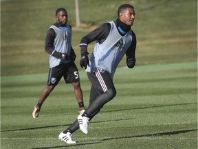 "The eyes are on Canadian soccer right now," says Impact's Patrice Bernier, right, at practice at Centre Nutrilait in Montreal on Nov. 9, 2016.