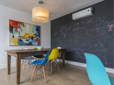 The dining area with replicas of Charles Eames chairs. (Dario Ayala / Montreal Gazette)