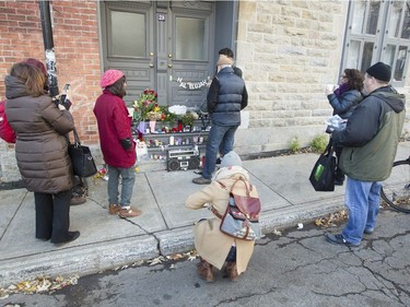 Leonard Cohen fans pay tribute outside the late singer/songwriter's house on Vallières in Montreal, Friday November 11, 2016.  Cohen died in 82 overnight on Thursday the 10th.
