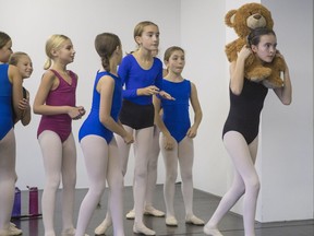 Samantha Rivard, right, rehearses a scene from Ballet Ouest's production of the Nutcracker.