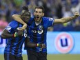 Montreal Impact's Dominic Oduro, left, celebrates his goal with Ignacio Piatti during first half action in game 1 of the MLS Eastern Conference final held at Olympic stadium in Montreal on Tuesday November 22, 2016.