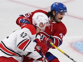 Montreal Canadiens defenceman Mark Barberio (45) keeps a close eye on Carolina Hurricanes' Joakim Nordstrom (42), during first period NHL action in Montreal on Thursday November 24, 2016.