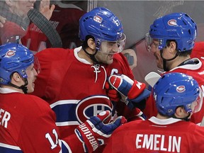 Canadiens' Max Pacioretty, centre, celebrates his goal with teammates Brendan Gallagher (11), Shea Weber (6) and Alexei Emelin (74), during third period NHL action in Montreal on Thursday, Nov. 24, 2016.