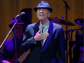 Leonard Cohen acknowledges cheers of the crowd as he takes the stage for his concert at the Bell Centre in Montreal on Wednesday, Nov. 28, 2012.