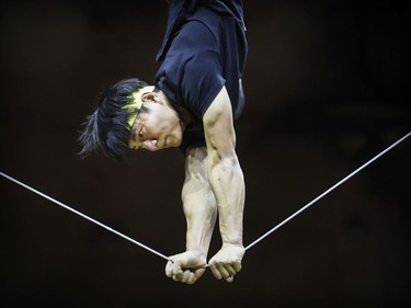 Slackline artist Qiu Jiangming works on his routine during rehearsal of Cirque du Soleil's Ovo at the Bell Centre in Montreal Tuesday November 29, 2016.