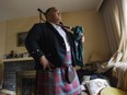 Professional piper Jeff McCarthy at home in Montreal, Thursday Nov. 3, 2016.