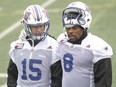 Slotback Nik Lewis (right) of the Montreal Alouettes walks with wide receiver Samuel Giguère at practice at Parc Hébert in the St-Leonard area of Montreal Thursday, November 3, 2016. The team was preparing for Saturday's C.F.L.  game against the Hamilton Tiger-Cats in Hamilton.