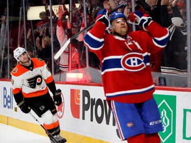 Philadelphia Flyers defenceman Shayne Gostisbehere is dejected as Canadiens centre Tomas Plekanec celebrates scoring a short- handed goal against Philadelphia Flyers goalie Michal Neuvirth during NHL action at the Bell Centre in Montreal on Saturday, Nov. 5, 2016.