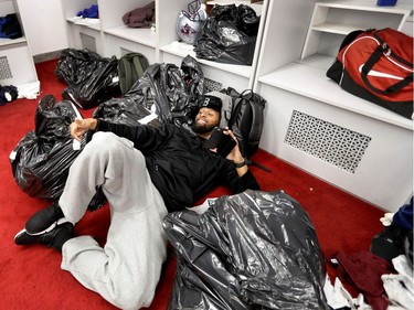 NOVEMBER 6, 2016-- Montreal Alouettes wide receiver Tiquan Underwood rests on his bags of clothing as he waits to see the team doctors in Montreal on Sunday, Nov, 6, 2016.