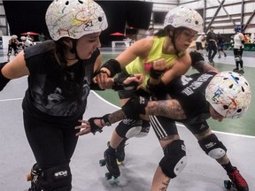 Members of the Montreal roller derby team the New Skids on the Block practice at TAZ in Montreal, on Wednesday, October 12, 2016, for the Women's Flat Track Derby Association championships in Portland, Ore.