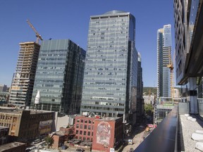 The view of downtown Montreal from a terrace at the Tour des Canadiens 1 on St-Antoine Street, next to the Bell Centre, Wednesday September 21, 2016.  The 50-storey building, Tour des Canadiens 2, is still under construction.  (Phil Carpenter / MONTREAL GAZETTE)