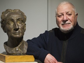 Roger Nincheri, grandson of Guido Nincheri, poses next to a bust of his famous relative at Chateau Dufresne in Montreal, Saturday, Nov. 26, 2016.