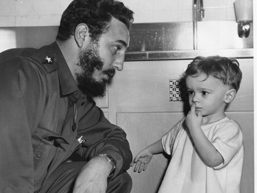 Cuban Premier Fidel Castro gives all his attention to two-year-old Luis Rosito, a patient at Ste-Justine Hospital, in April 1959, during a visit to Montreal. "This is a wonderful hospital," Castro said.