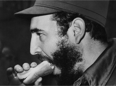 Cuban leader Fidel Castro eats a hot dog in Montreal in April 1959.