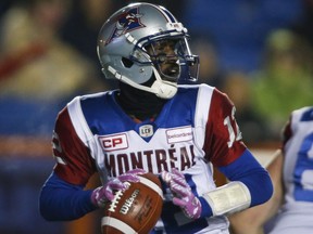 Montreal Alouettes quarterback Rakeem Cato looks for a receiver during second half CFL football action against the Calgary Stampeders in Calgary, Saturday, Oct. 15, 2016.