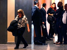 Rosa Robinson, left, mother of victim Pamela Jean, leaves the courtroom during a break in Juan Fermin Palma's murder trial at Montreal's Palais de Justice Nov. 8, 2016.