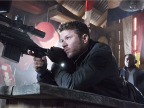 Ryan Phillippe as Bob Lee Swagger and Omar Epps and Isaac Johnson in Shooter, on Bravo.