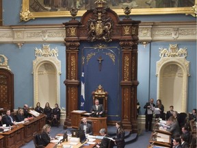 The National Assembly legislature is shown during question period Tuesday, February 23, 2016 in Quebec City. The crucifix, which is over the Speaker's chair, was introduced in 1936 by conservative nationalist Maurice Duplessis, who was then premier.