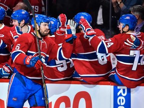 Shea Weber #6 of the Montreal Canadiens celebrates his third period goal with teammates on the bench against the Toronto Maple Leafs during the NHL game at the Bell Centre on October 29, 2016 in Montreal, Quebec, Canada.  The Montreal Canadiens defeated the Toronto Maple Leafs 2-1.
