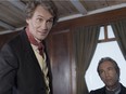 A still image from a  Heritage Minute episode shows John A. Macdonald discussing the proposed Confederation plan.