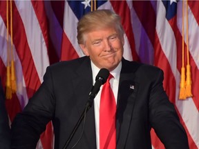 Republican presidential elect Donald Trump speaks during election night at the New York Hilton Midtown in New York on November 9, 2016.  /