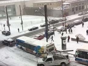 Screenshot from a  viral Facebook video showing several vehicles sliding down Côte du Beaver Hall in downtown Montreal, Dec. 5, 2016.
