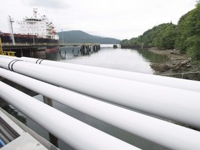 A ship receives its load of oil from the Kinder Morgan Trans Mountain Expansion Project's Westeridge loading dock in Burnaby, British Columbia, Thursday, June 4, 2015. A survey conducted for the Montreal Economic Institute suggests two out three Quebecers think western Canada should be their first choice for imports.