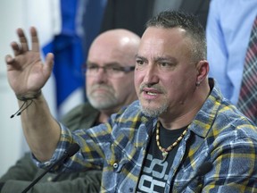Bernard "Rambo" Gauthier speaks at a news conference as they announce the creation of a new political party, Dec. 6, 2016, at the legislature in Quebec City.