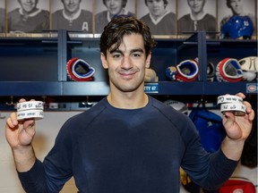 Max Pacioretty of the Montreal Canadiens poses for a photo with four pucks after scoring four goals against the Colorado Avalanche at the Bell Centre on December 10, 2016.
