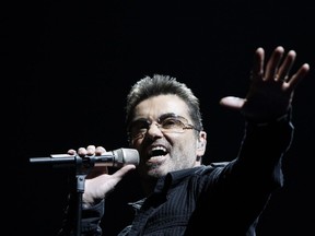 In this June 25, 2008, file photo, singer George Michael performs during his "Live Global Tour" concert in Inglewood, Calif. Michael, who rocketed to stardom with WHAM! and went on to enjoy a long and celebrated solo career lined with controversies, has died, his publicist said Sunday, Dec. 25, 2016. He was 53.