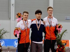 Speedskater Christoper Fiola, left, is hoping for the return of the medals and other valuables stolen from his parents' home.