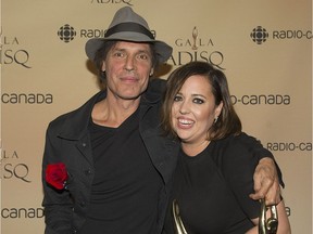 Jean Leloup and Ariane Moffatt pose for the cameras at the annual Gala Adisq awards ceremony in Montreal Sunday, November 8, 2015.