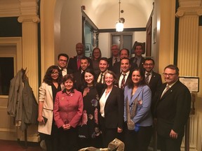 Jewish and Muslim Members of Parliament pose for a group photo after their "Christmas dinner" in Ottawa Dec. 7, 2016.