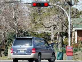 A vehicle makes a legal right turn on a red light at  in Brossard on April 3, 2012.