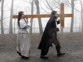 A 2007 re-enactment of Paul de Chomedey de Maisonneuve's 1643 trek up Mount Royal with a cross, here accompanied by Jeanne Mance: The cross was to give thanks that the settlement of Ville Marie was spared from menacing floodwaters.