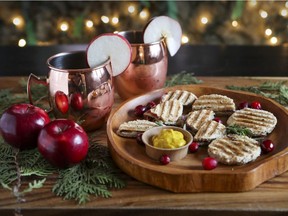 Miniature grilled cheese sandwiches: Layers of cheddar, pear or apple, sautéed red onion slices and cranberry relish.