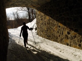 A skier on Mount Royal: Montrealers should be able to take their skis on public transit, so long as they are careful — and hold them vertically.