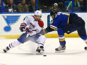 David Desharnais, left, had just been promoted to the Canadiens' top line when he injured his knee while playing against the Blues in St. Louis on Tuesday night.