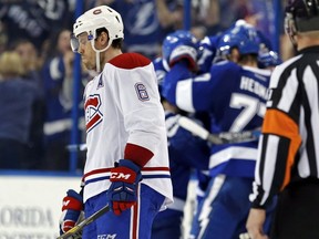 Shea Weber #6 of the Montreal Canadiens reacts as members of the Tampa Bay Lightning celebrate a goal during the third period at Amalie Arena on December 28, 2016 in Tampa, Florida.