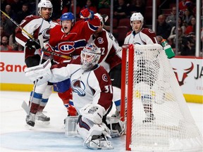 Canadiens' Daniel Carr celebrates after centre Brian Flynn scored against Colorado Avalanche goalie Calvin Pickard during NHL action at the Bell Centre in Montreal on Saturday Dec. 10, 2016.