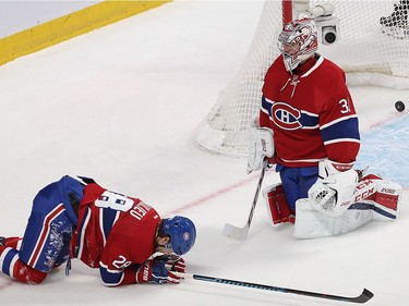 Montreal Canadiens goalie Carey Price and Nathan Beaulieu (28) after the goal of Boston Bruins' Austin Czarnik during second period NHL action in Montreal on Monday December 12, 2016.