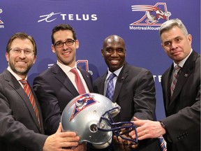Montreal Alouettes' new management team: director Andrew Wetenhall, left, president and CEO Patrick Boivin, General Manager Kavis Reed, and Head Coach Jacques Chapdelaine, right.