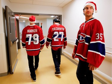 Montreal Canadiens goalie Al Montoya looks back down a ward hallway as he and Montreal Canadiens defenceman Andrei Markov and Montreal Canadiens centre Alex Galchenyuk take part in the Montreal Canadiens annual visit to the Montreal Children's Hospital in Montreal on Wednesday Dec. 14, 2016.