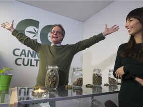 Marc Emery, left, addresses supporters during a news conference to announce the opening of Cannabis Culture marijuana stores, in Montreal, Thursday, Dec. 15, 2016, as his wife, Jodie Emry, looks on.